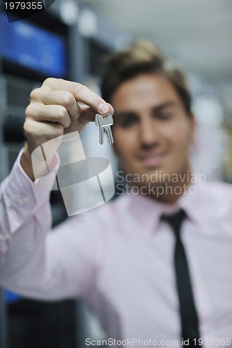 Image of young it engineer in datacenter server room