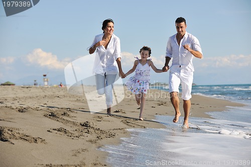 Image of happy young  family have fun on beach