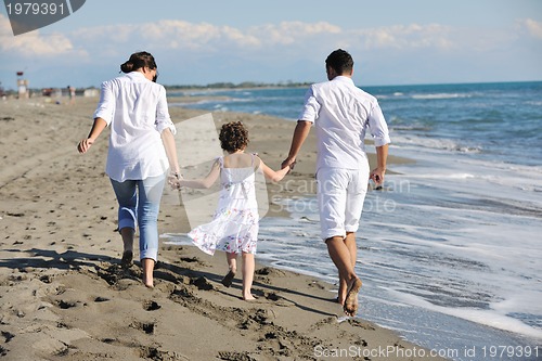Image of happy young  family have fun on beach
