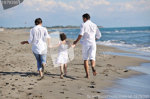 Image of happy young  family have fun on beach