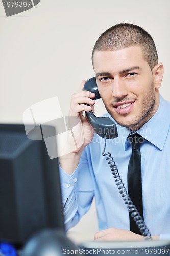 Image of businessman with a headset