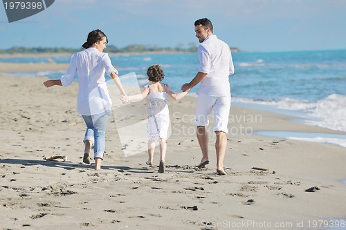 Image of happy young  family have fun on beach