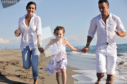 Image of happy young  family have fun on beach