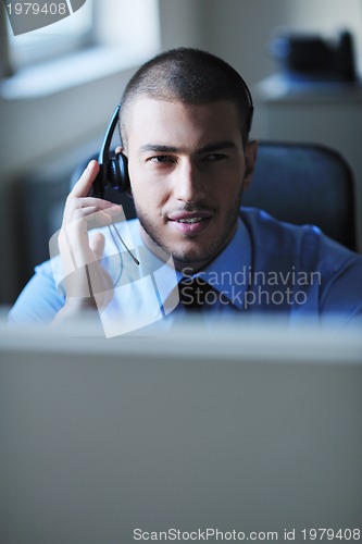 Image of businessman with a headset