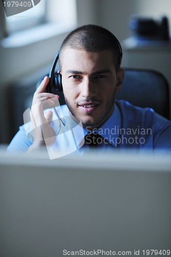 Image of businessman with a headset