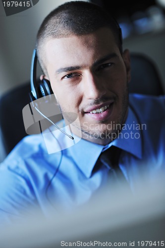 Image of businessman with a headset