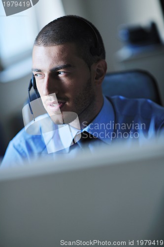 Image of businessman with a headset