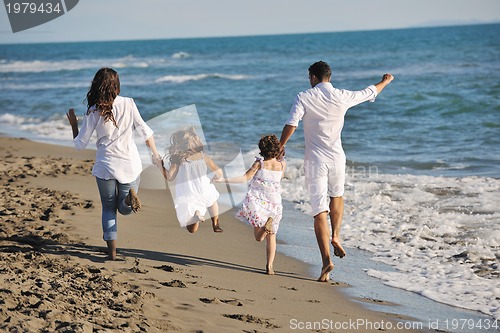 Image of happy young  family have fun on beach