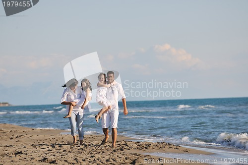 Image of happy young  family have fun on beach