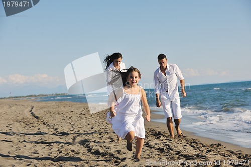 Image of happy young  family have fun on beach