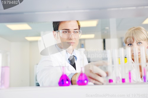 Image of science people in bright lab