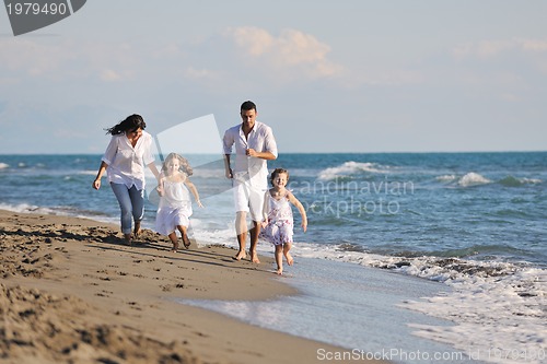 Image of happy young  family have fun on beach