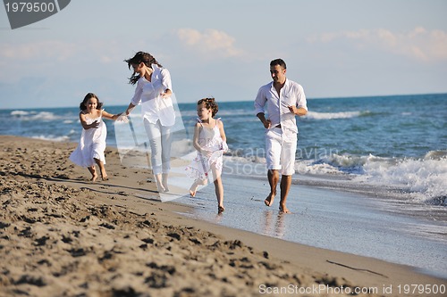 Image of happy young  family have fun on beach