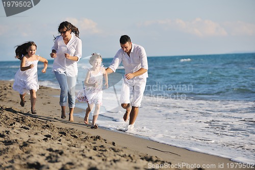 Image of happy young  family have fun on beach