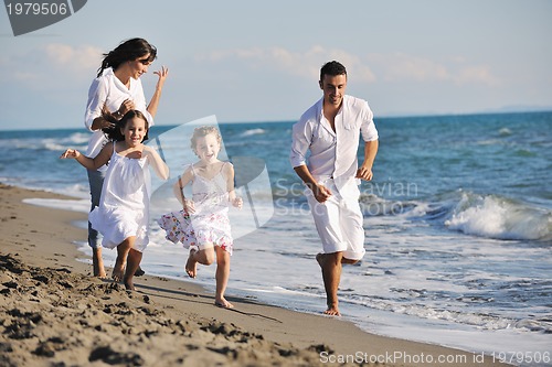 Image of happy young  family have fun on beach