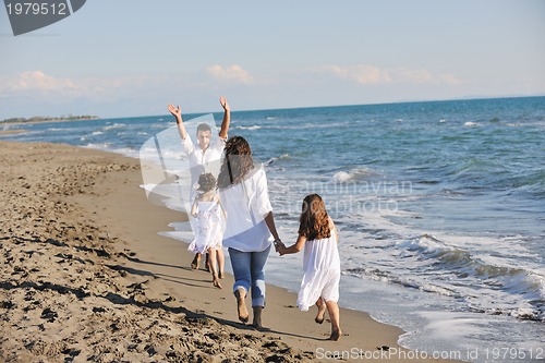 Image of happy young  family have fun on beach