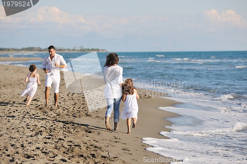Image of happy young  family have fun on beach