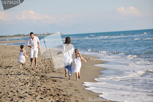 Image of happy young  family have fun on beach