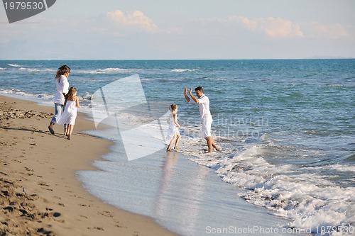 Image of happy young  family have fun on beach