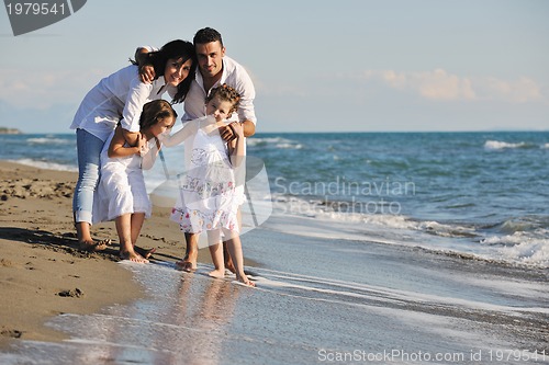 Image of happy young  family have fun on beach