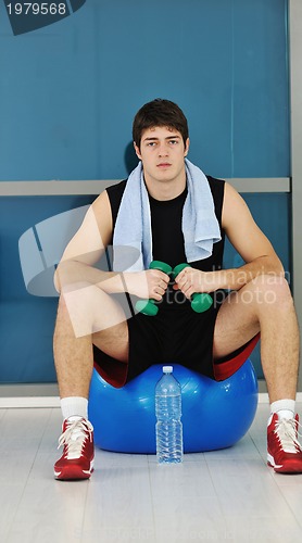 Image of man drink water at fitness workout