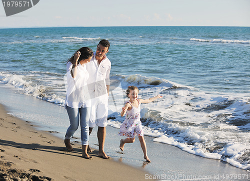 Image of happy young  family have fun on beach