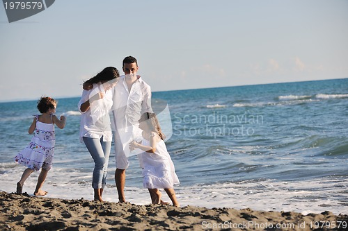 Image of happy young  family have fun on beach
