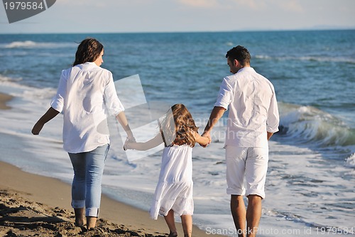 Image of happy young  family have fun on beach