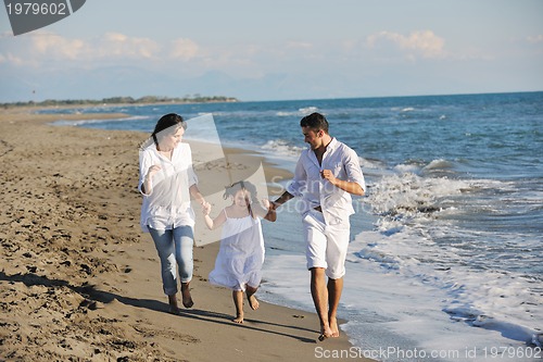 Image of happy young  family have fun on beach