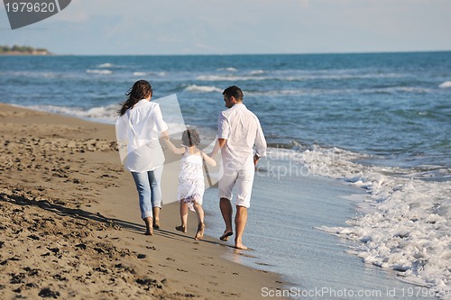 Image of happy young  family have fun on beach
