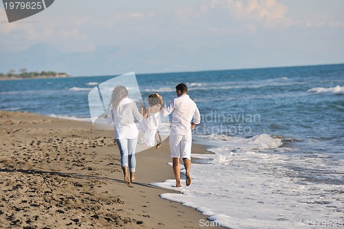 Image of happy young  family have fun on beach