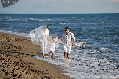 Image of happy young  family have fun on beach