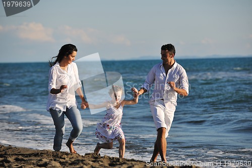 Image of happy young  family have fun on beach
