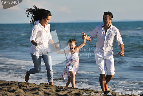 Image of happy young  family have fun on beach