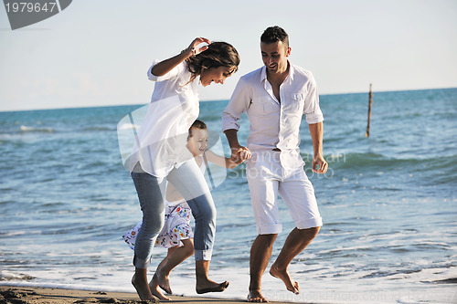 Image of happy young  family have fun on beach