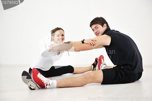 Image of happy young couple fitness workout and fun