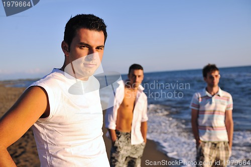Image of young man at beach