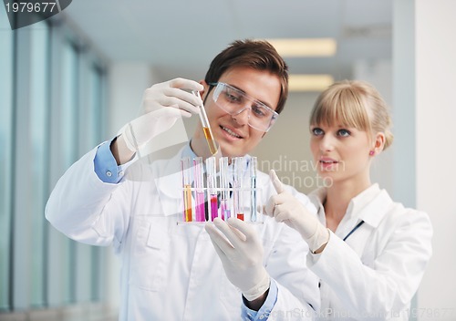 Image of science people in bright lab