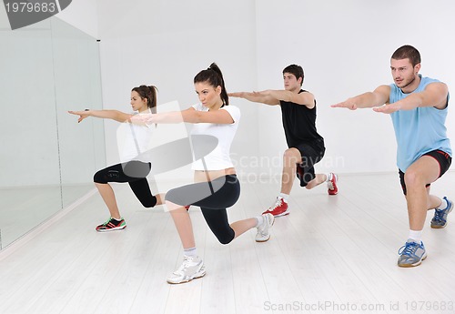 Image of young people group in fitness club