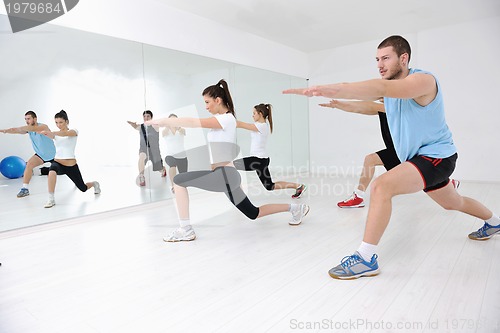 Image of young people group in fitness club