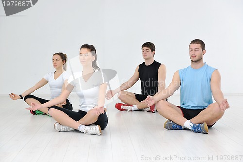 Image of young people group in fitness club