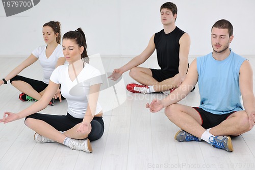 Image of young people group in fitness club