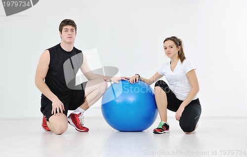 Image of happy young couple fitness workout and fun