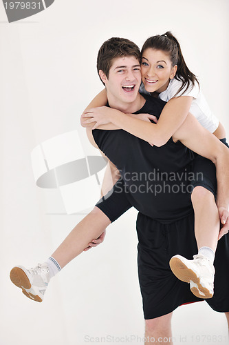 Image of happy young couple fitness workout and fun