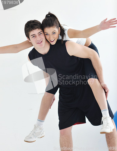 Image of happy young couple fitness workout and fun