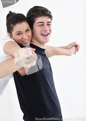 Image of happy young couple fitness workout and fun