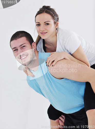 Image of happy young couple fitness workout and fun