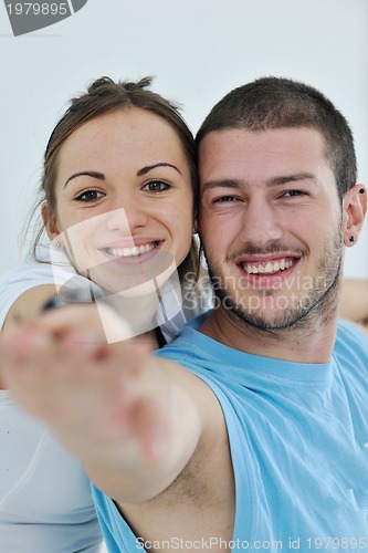 Image of happy young couple fitness workout and fun