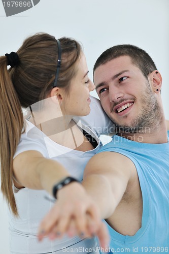 Image of happy young couple fitness workout and fun