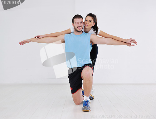 Image of happy young couple fitness workout and fun